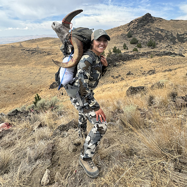 Tori Roberts packing out her bighorn.