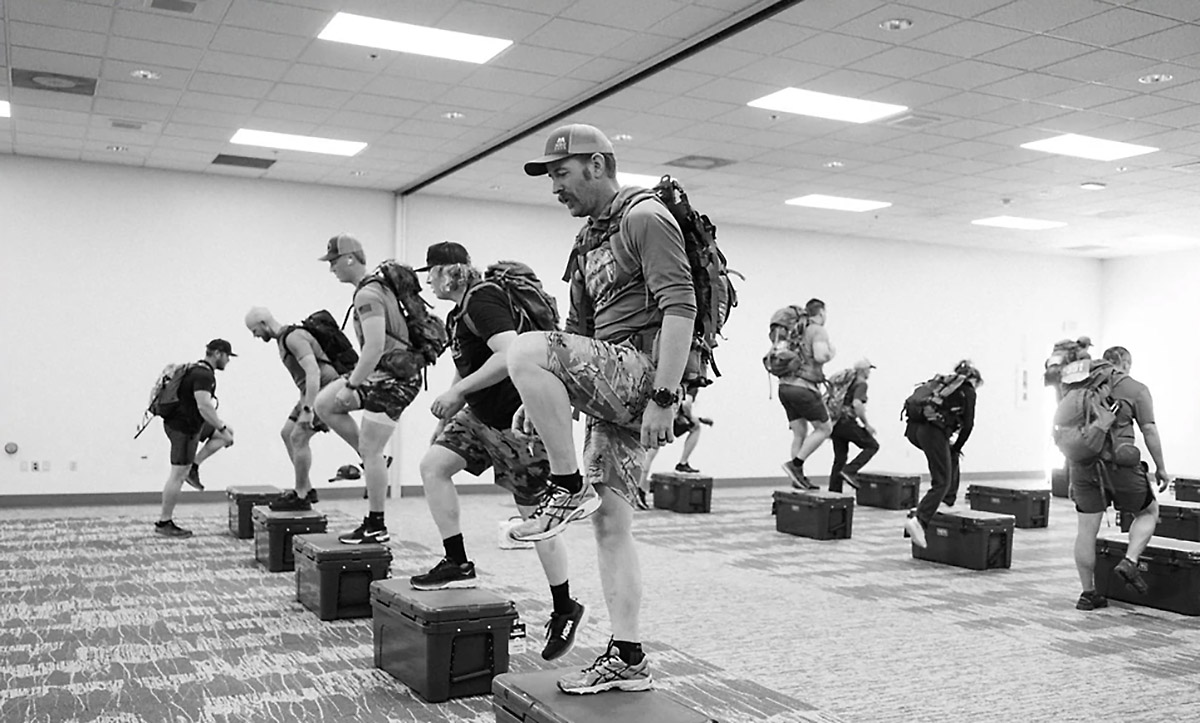 Athletes doing step ups onto YETI coolers Athletes doing step ups onto YETI coolers