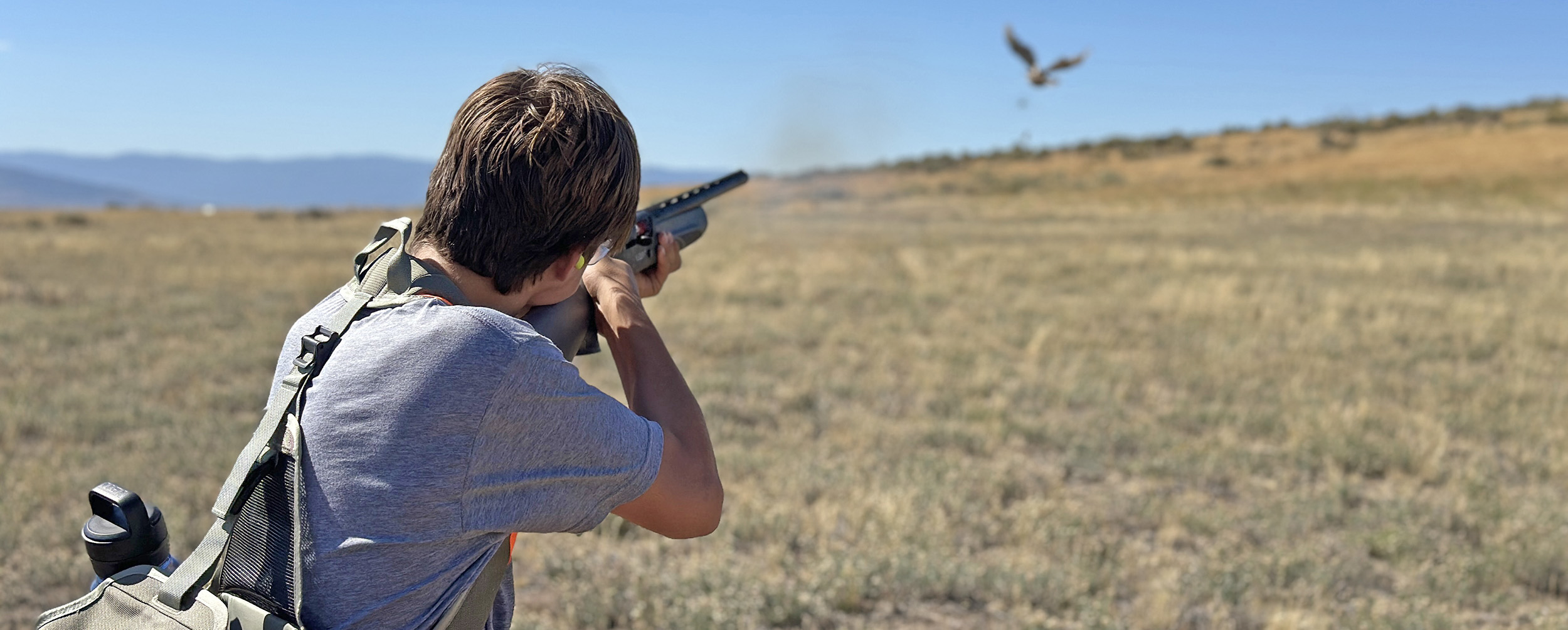 Youth hunting chukar