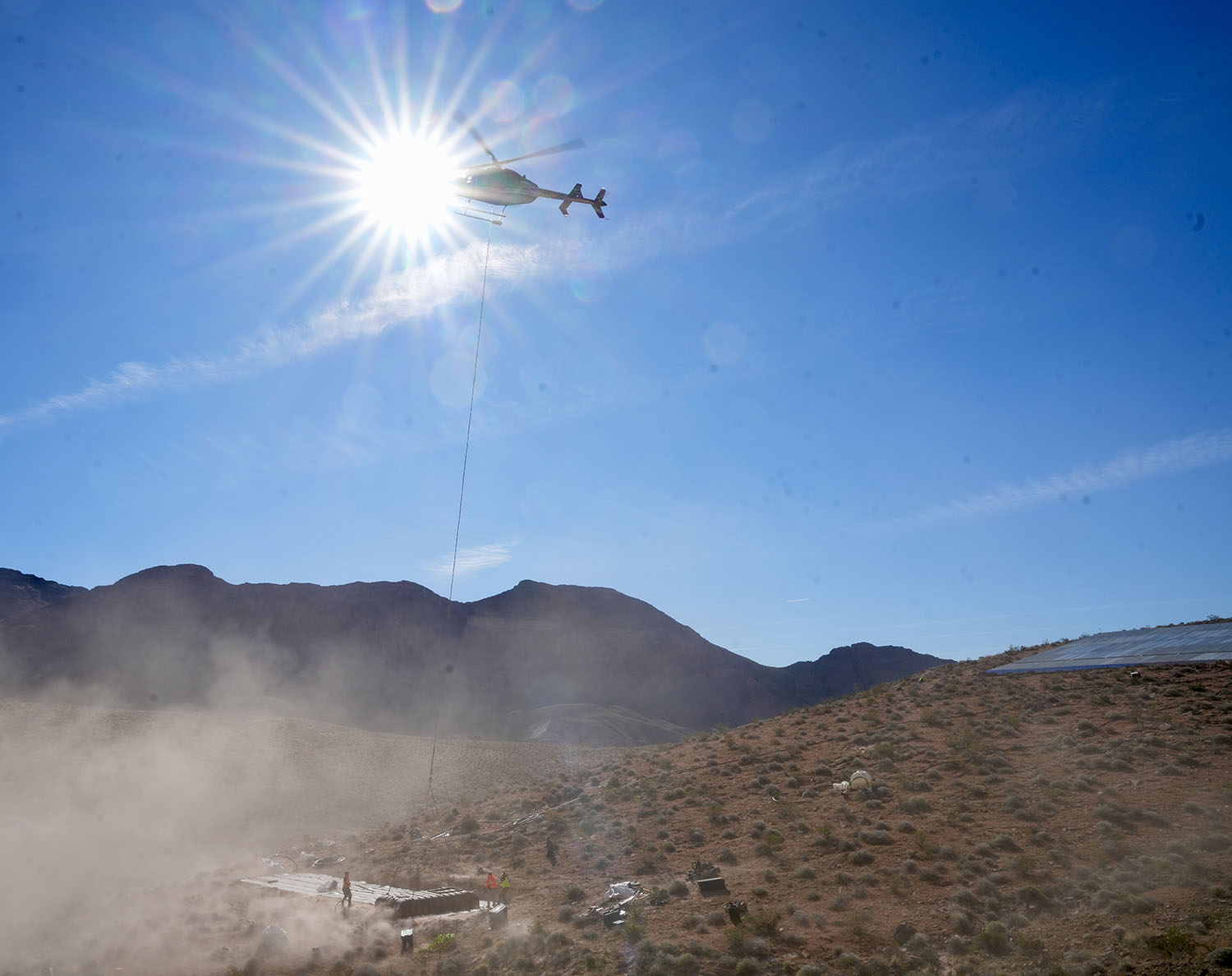 Helicopter bringing in components for the GoHunt Guzzler in Nevada