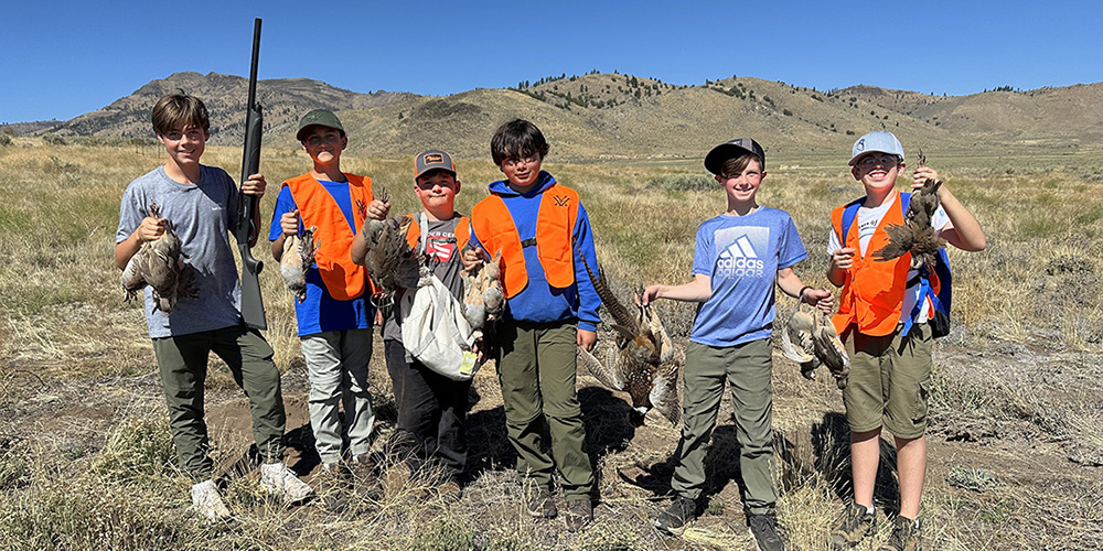 Group of youth hunters with chukars